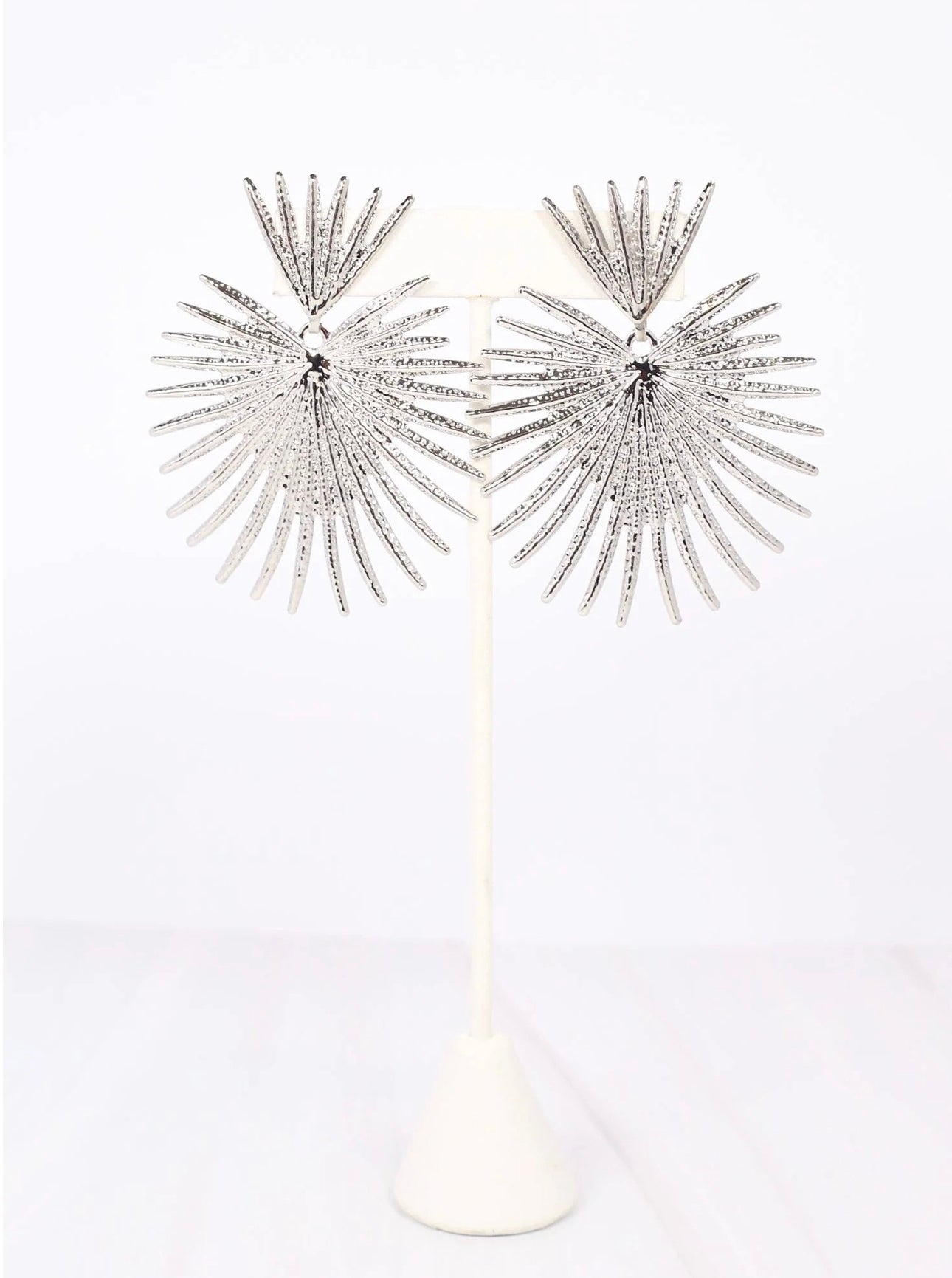 Haris Silver Metal Sunburst Dangle Earrings