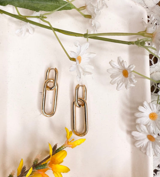 Halsey Gold Linked Metal Oval Hinged Hoop Earrings
